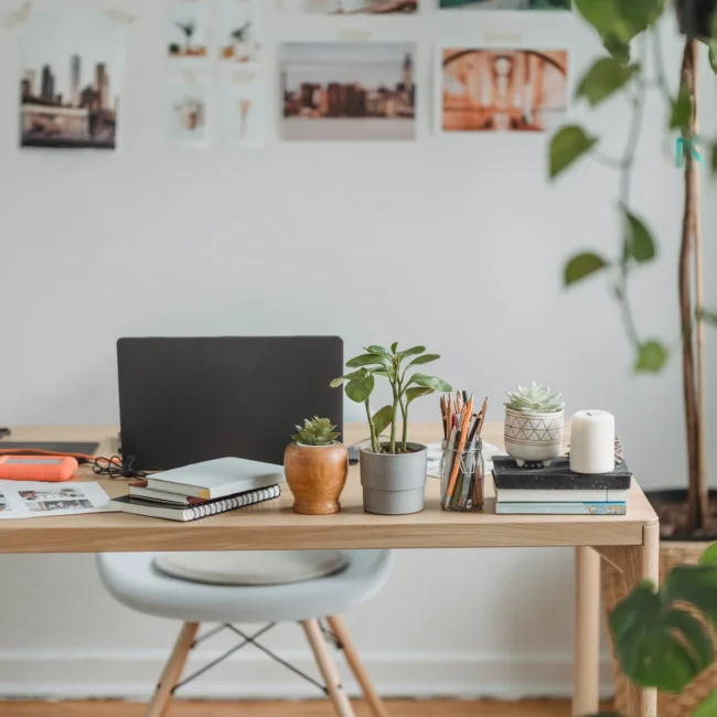 Digital Marketing Manager work station displayed, including a laptop, chair, table, and other decorations